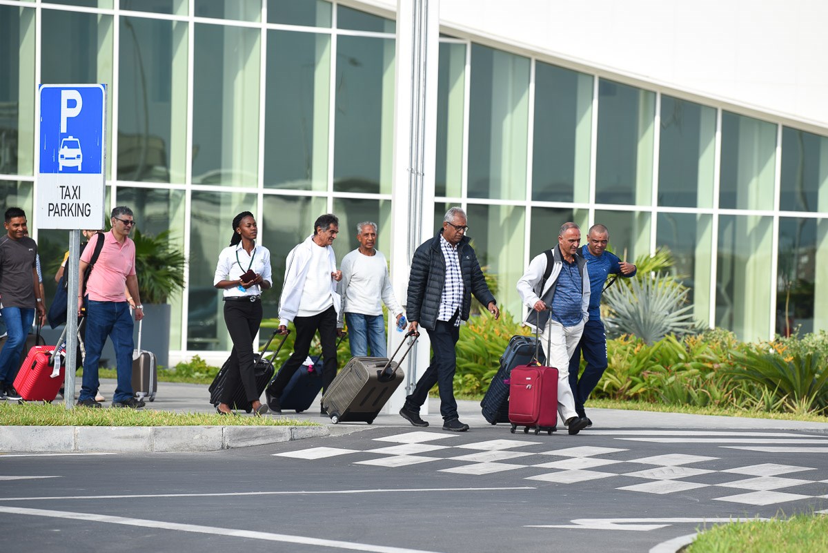 Karyakars arrive at the airport