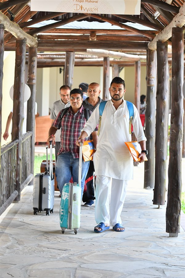 Karyakars arrive at White Sands Hotel and The Beach Resort, venue for the shibir