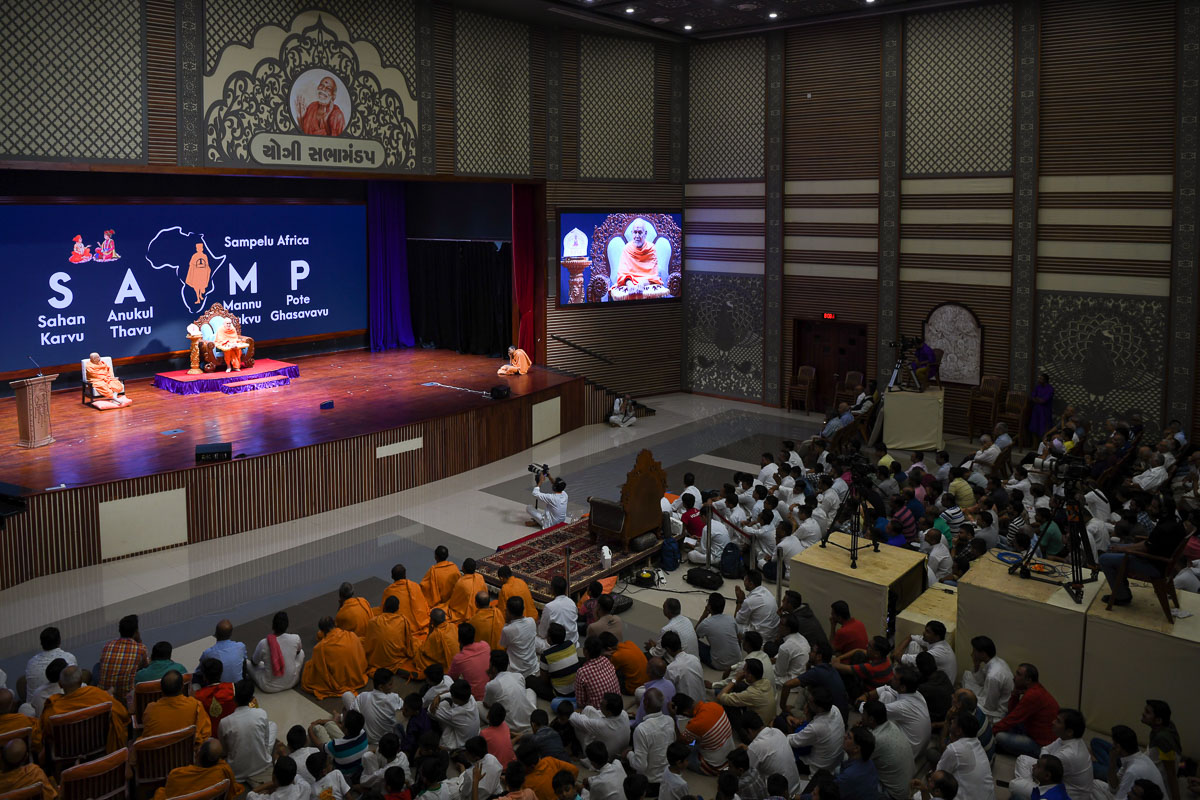 Sadhus and devotees during the assembly