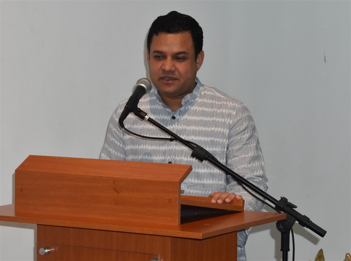 The Hon'ble Mr. Amit Kumar Mishra, Consul General of India in São Paulo, Brazil addressing the assembly