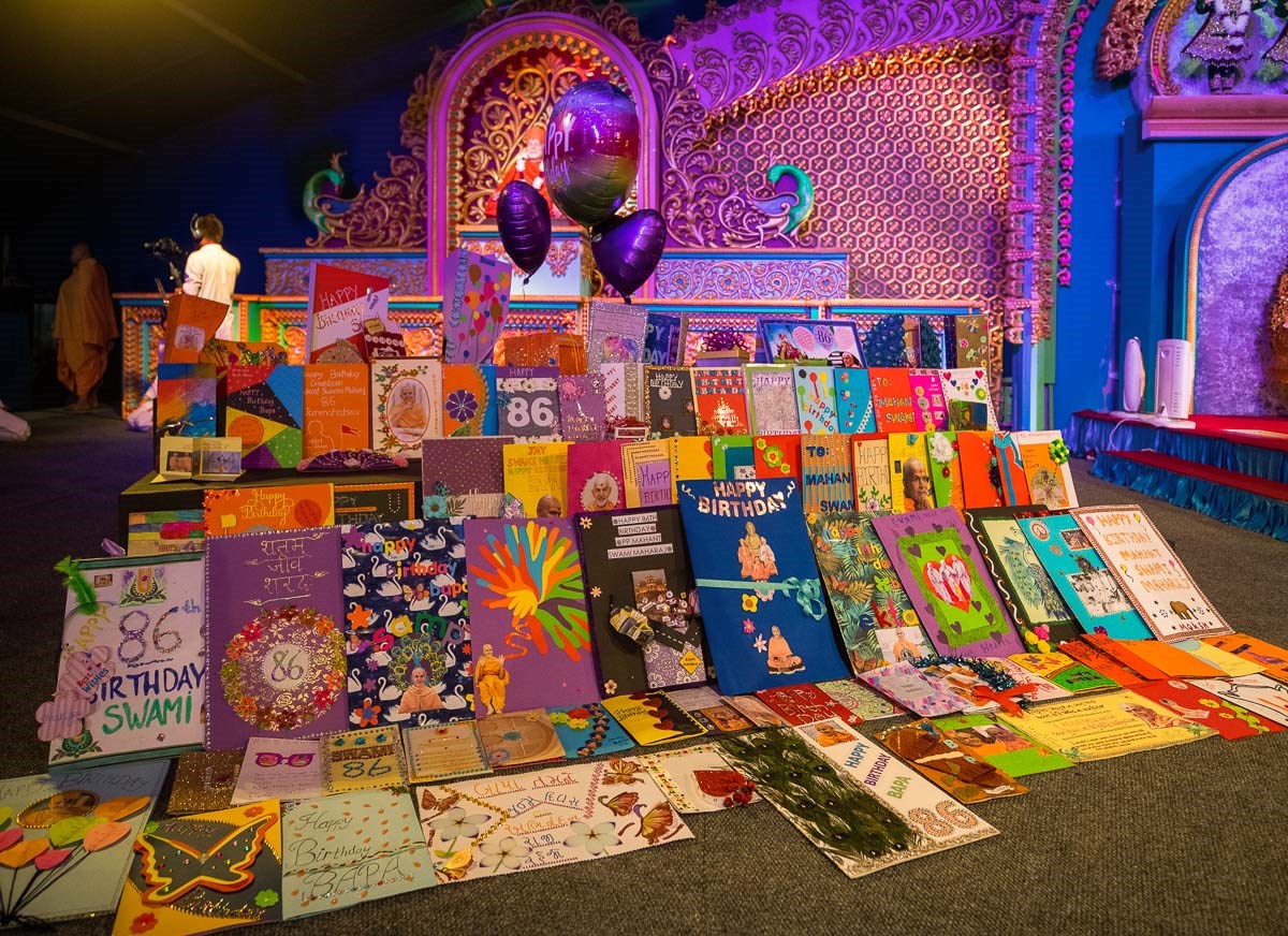 Greeting cards on the stage made by devotees