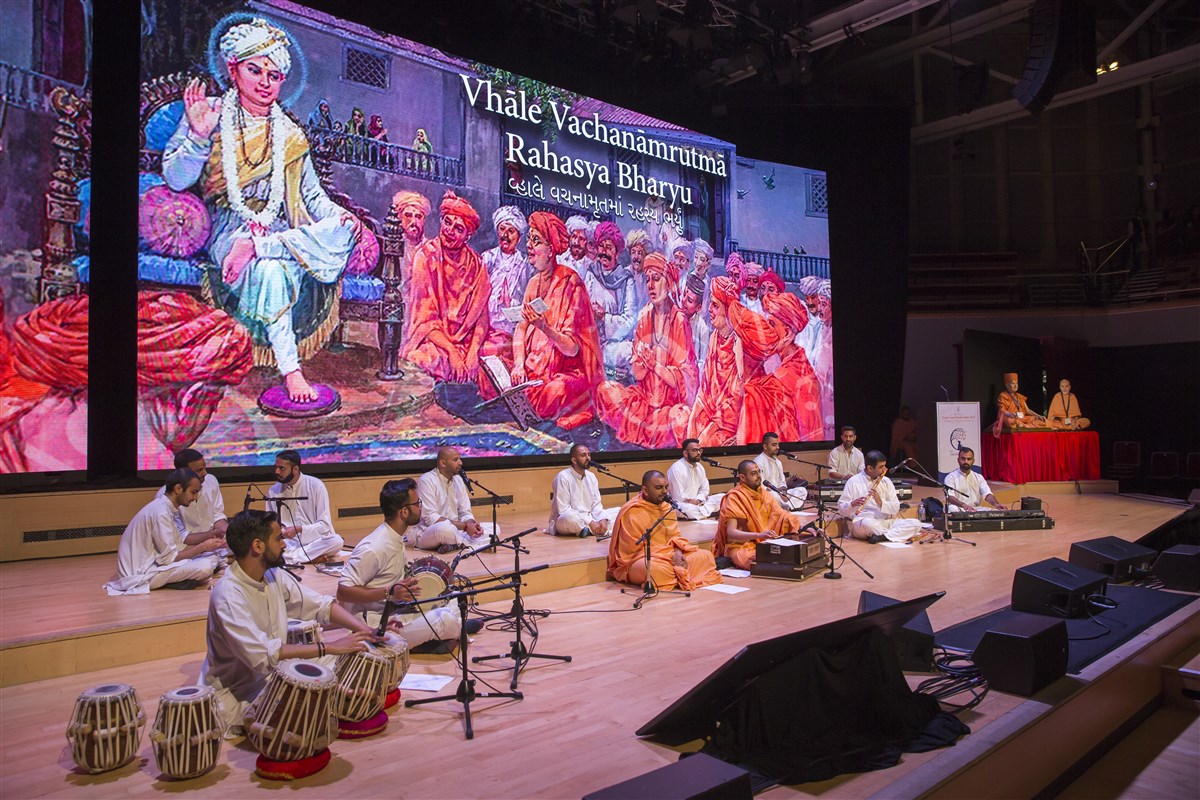 Swamis and youths perform bhajans associated with the Vachanamrut