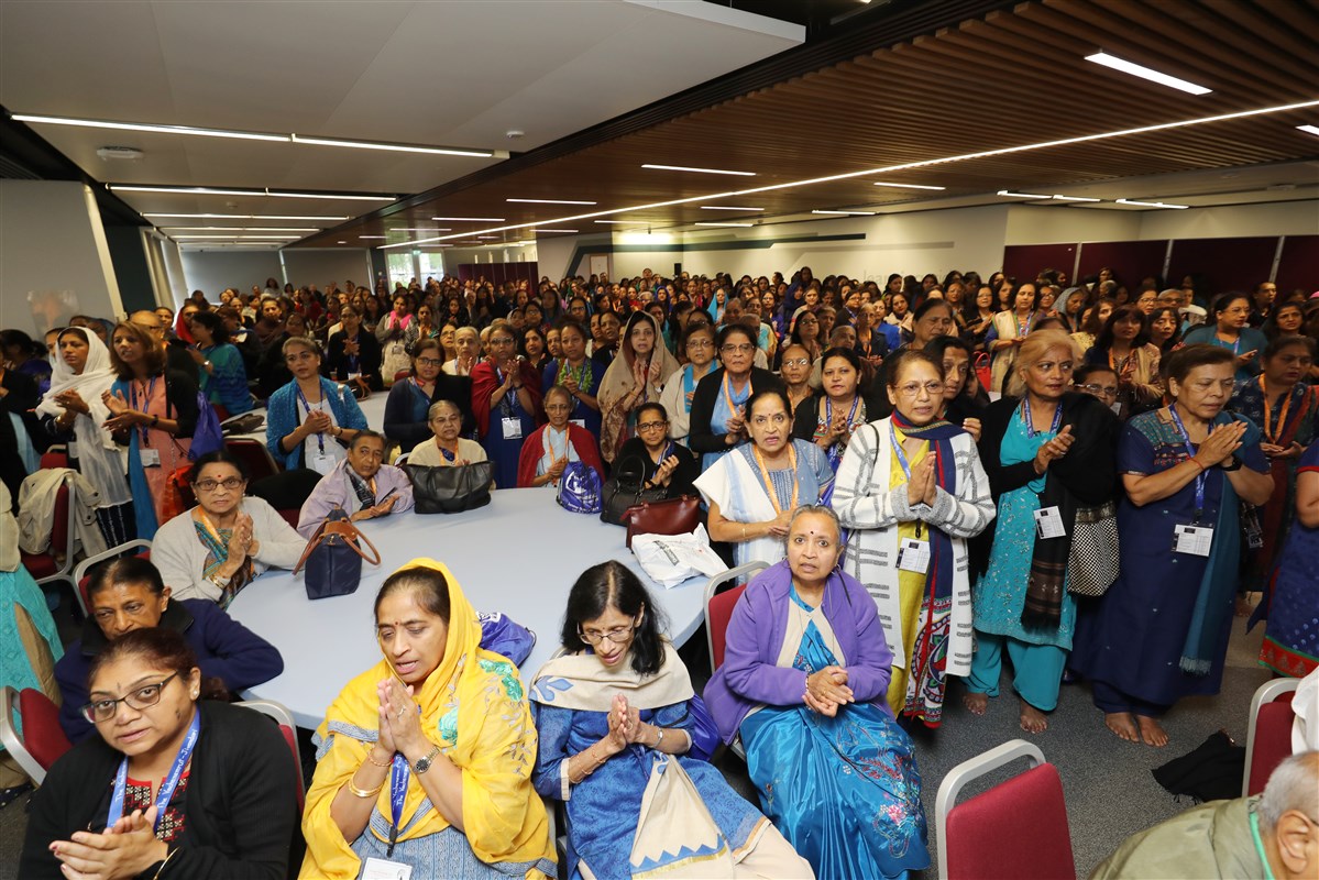 Delegates engage in the morning arti on Day 2