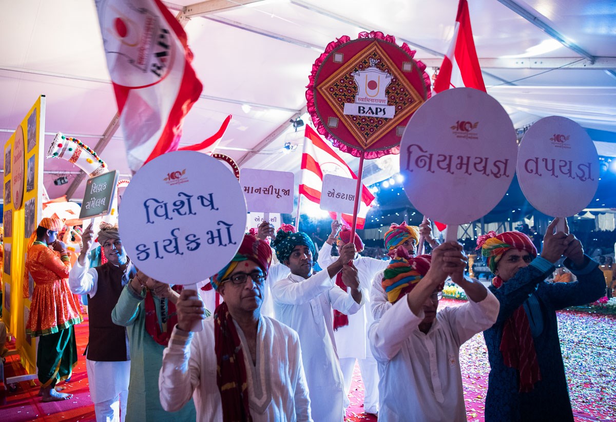 Devotees participate in a parade