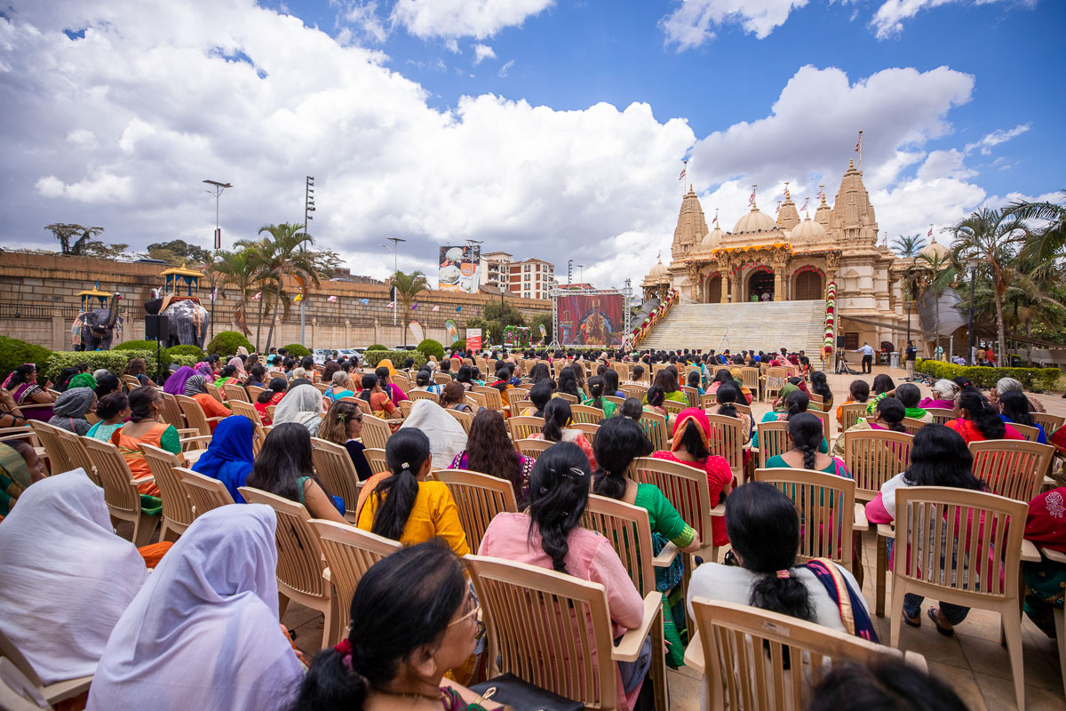 Devotees during the mahapuja in the mandir grounds