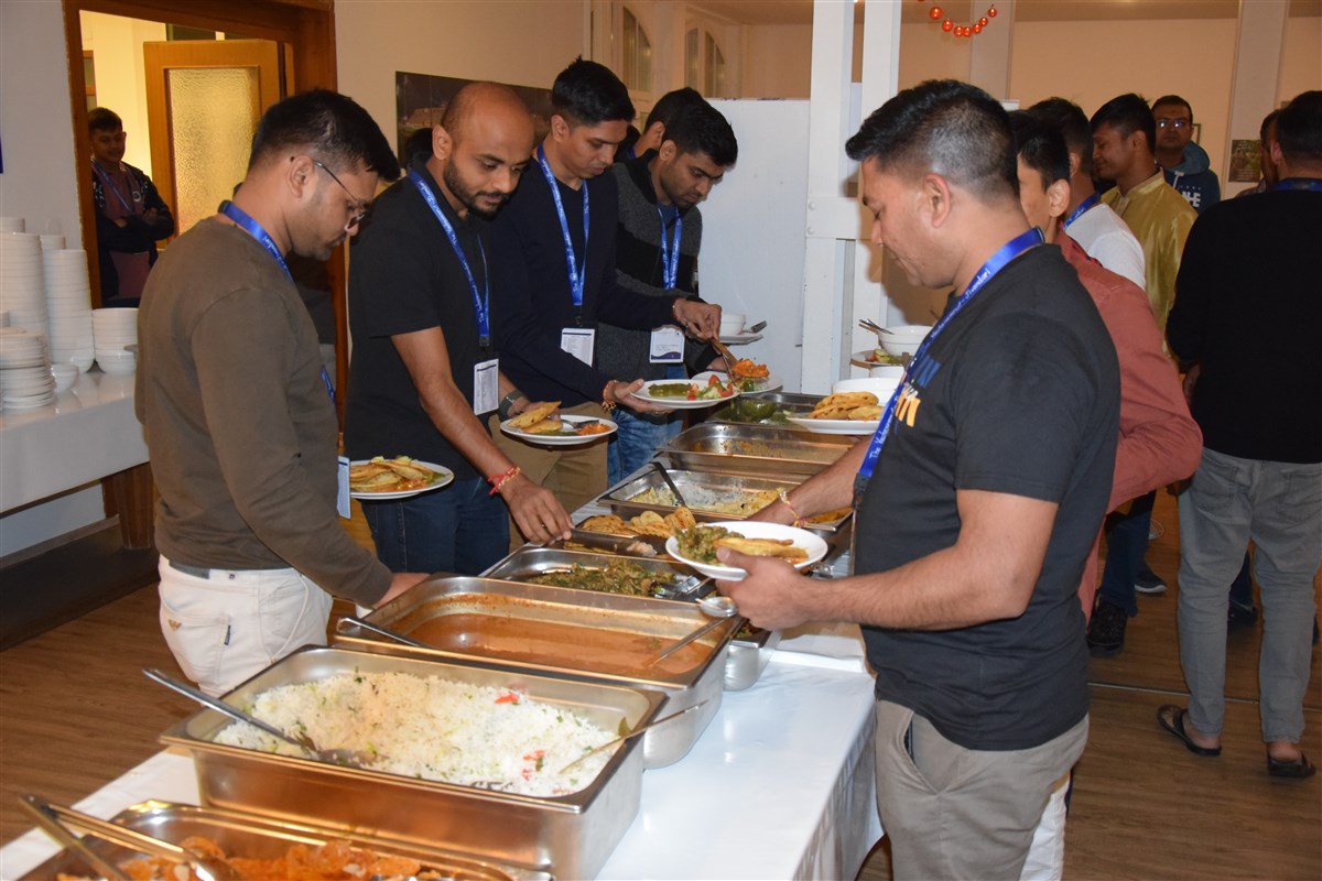 Delegates enjoy a buffet meal