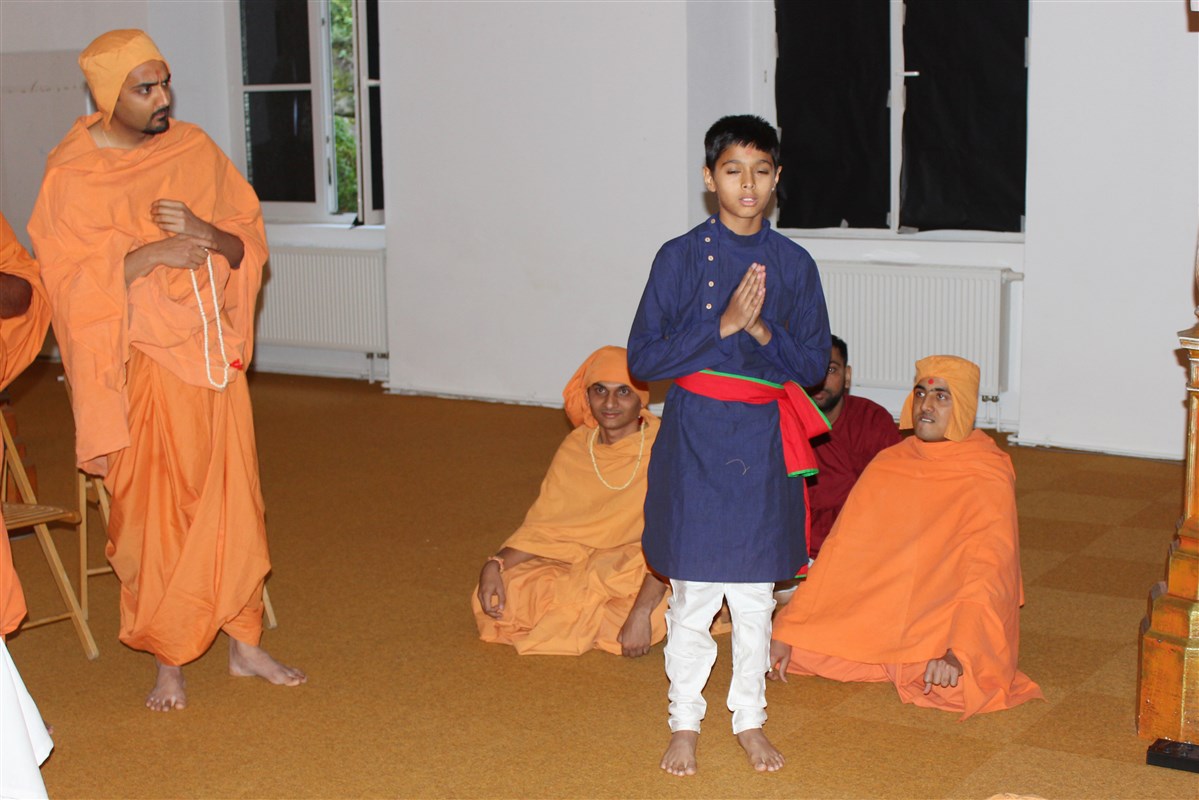 Volunteers perform a drama recounting an incident that took place before Bhagwan Swaminarayan