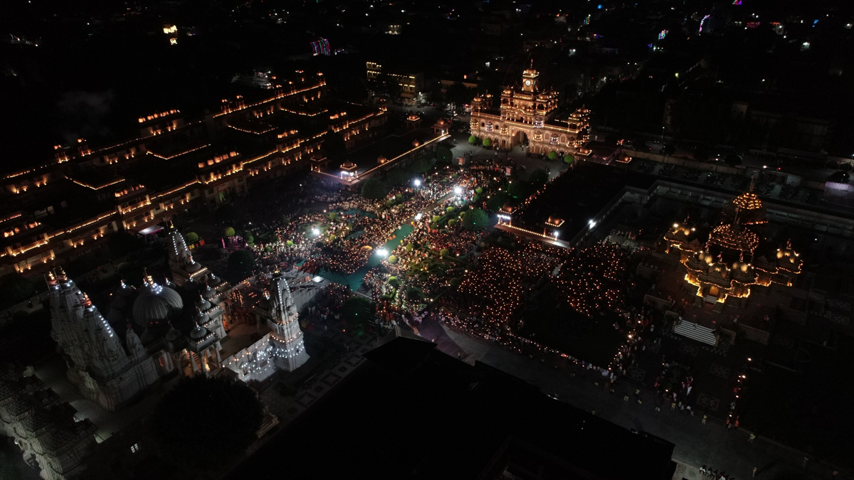 Devotees perform the arti