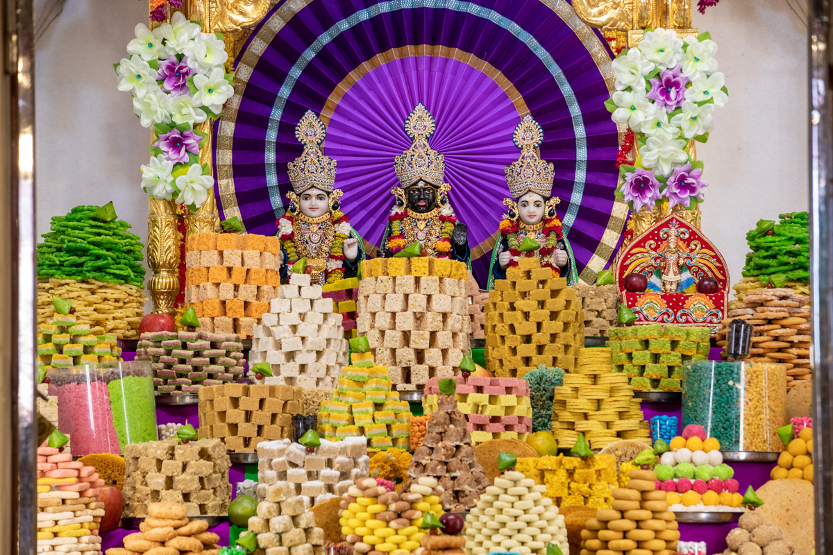 Annakut offered to Bhagwan Swaminarayan, Aksharbrahman Gunatitanand Swami and Shri Gopalanand Swami