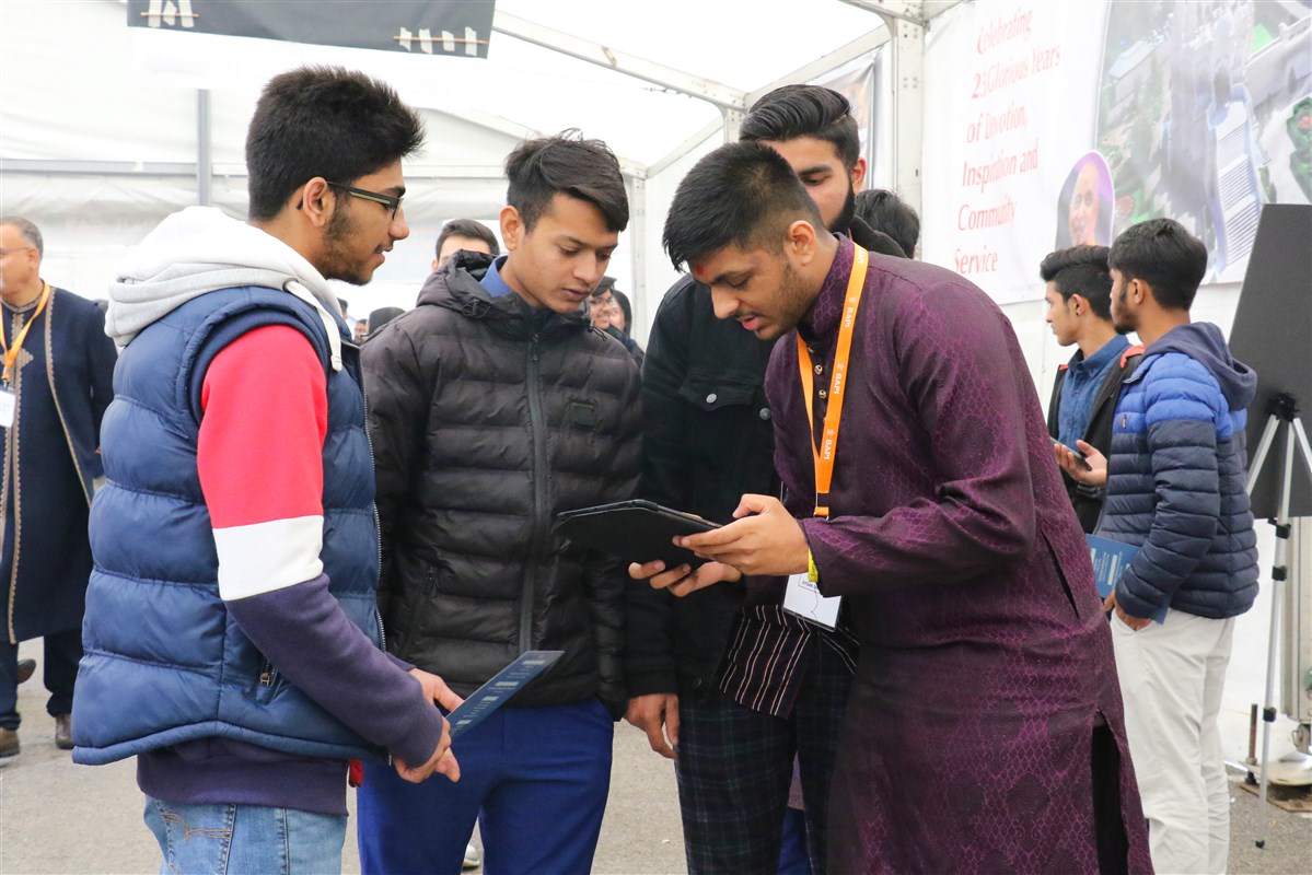 Volunteers answered visitor queries about the Mandir's activities