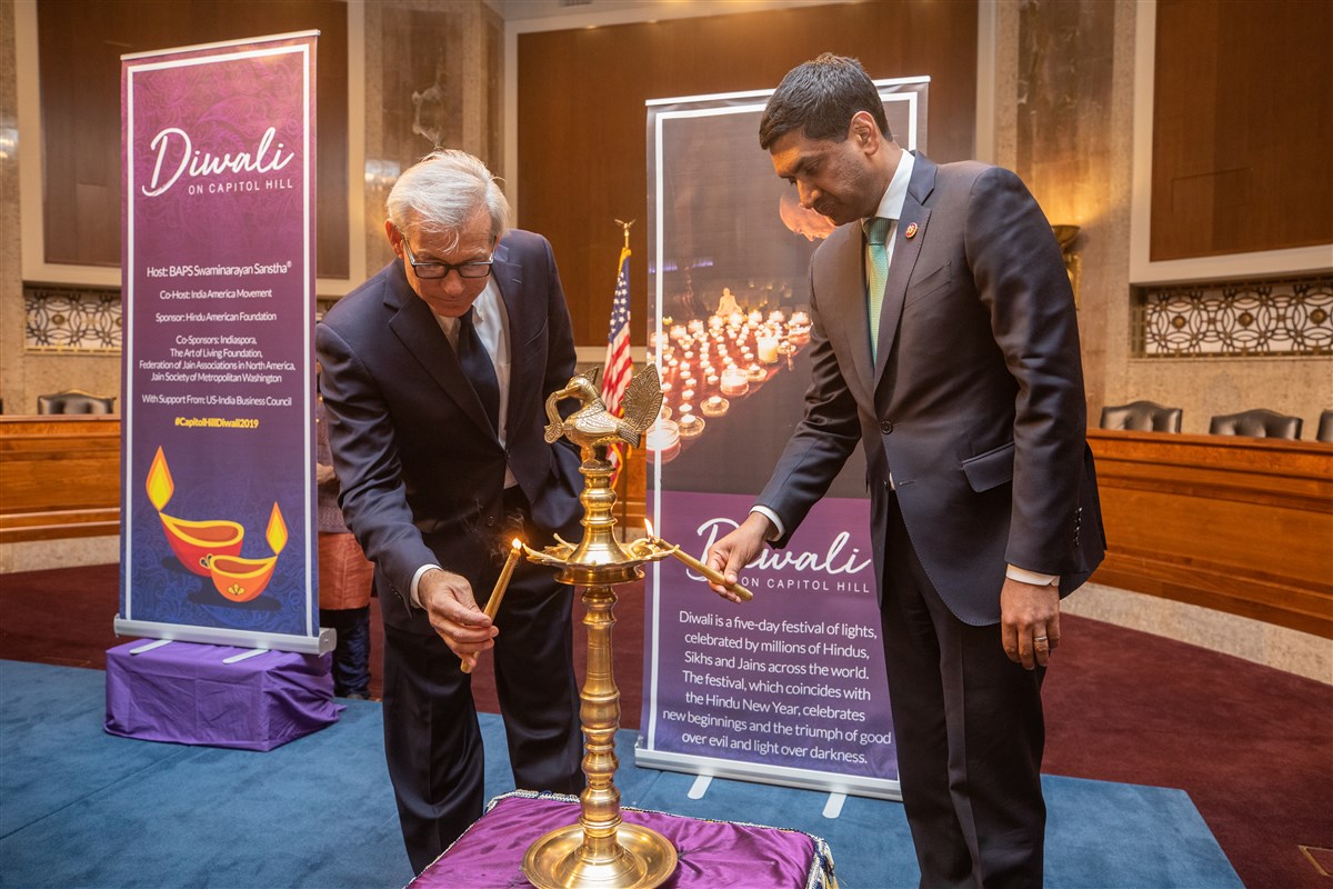 Reps. David Schweikert (AZ-6) and Ro Khanna (CA-17) participate in the traditional lighting of the diya