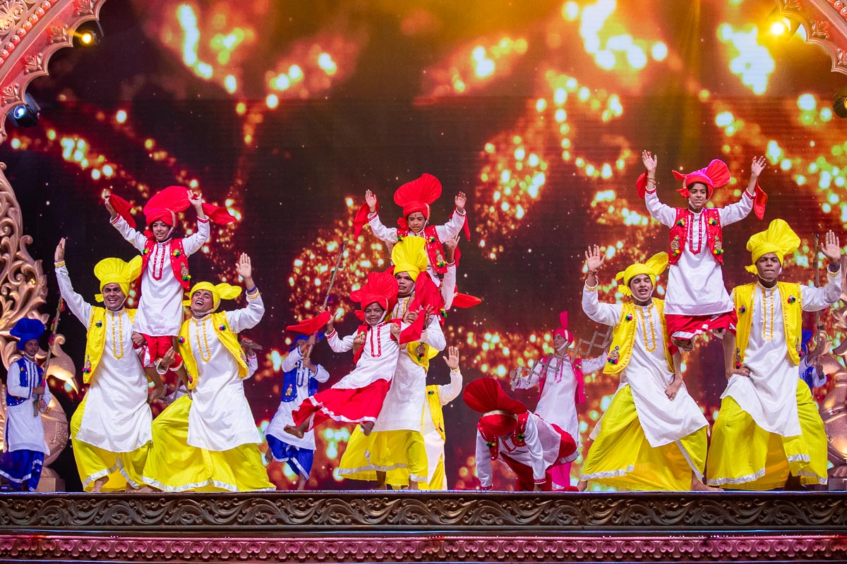 Children and youths perform a traditional dance