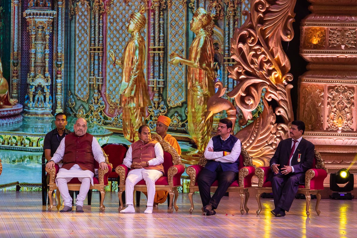 Dignitaries on stage during the assembly