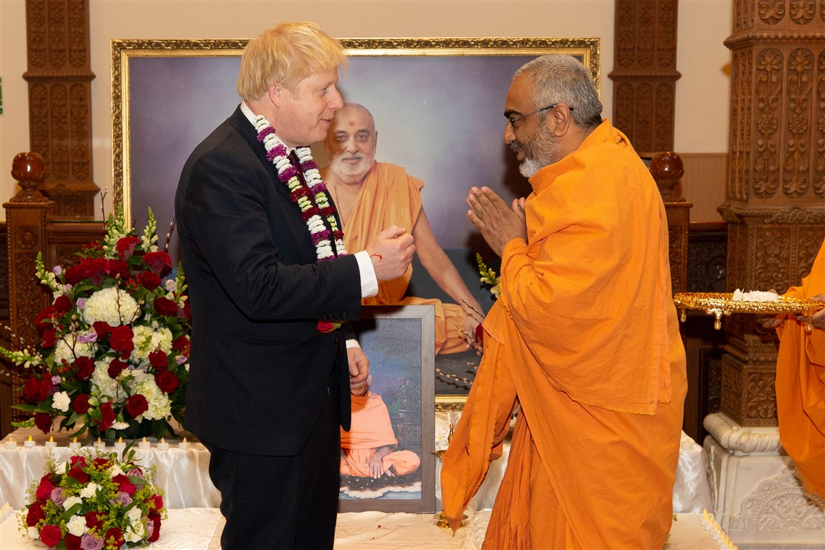 Prime Minister Boris Johnson was greeted by Yogvivekdas Swami in traditional Hindu manner with gestures of goodwill and benevolence