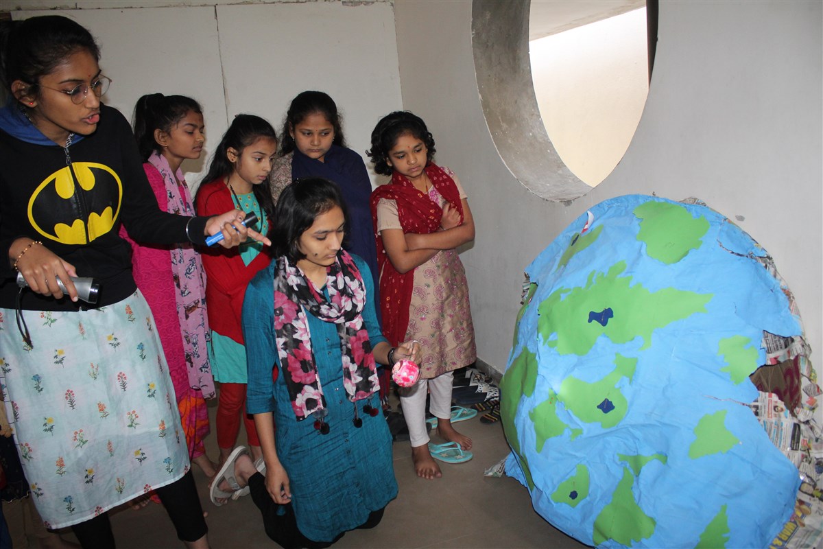 Students of 11th standard explained Eclipse with practical Examples to younger students 