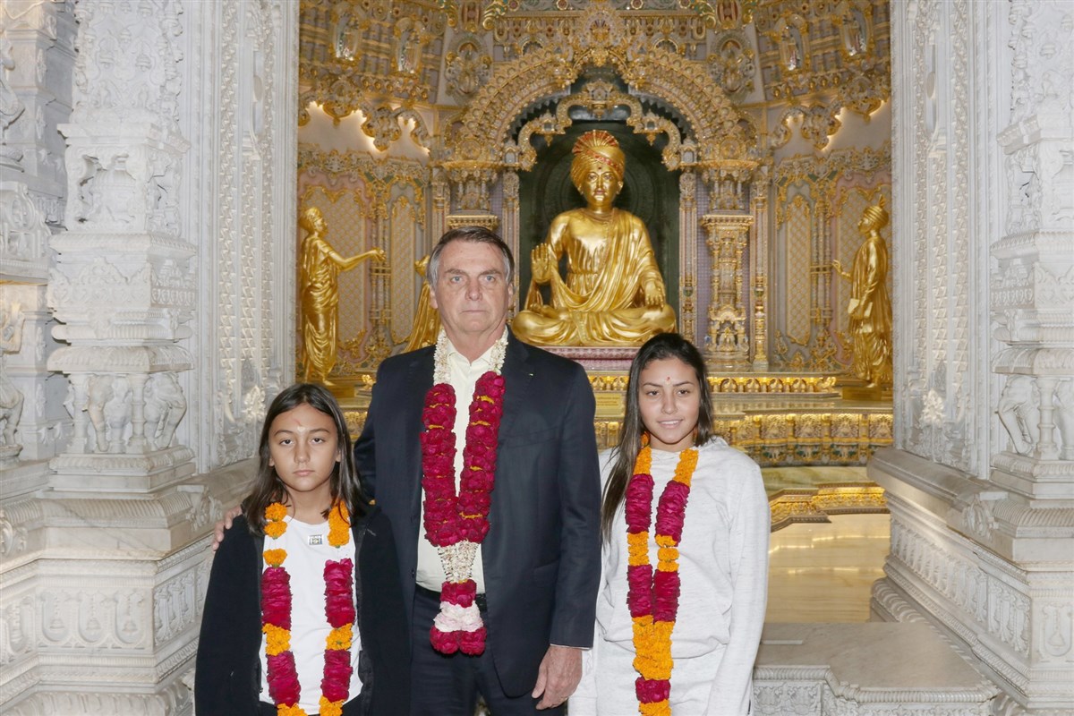 Brazilian President Jair Bolsonaro and his daughters pay respects at Swaminarayan Akshardham Mandir