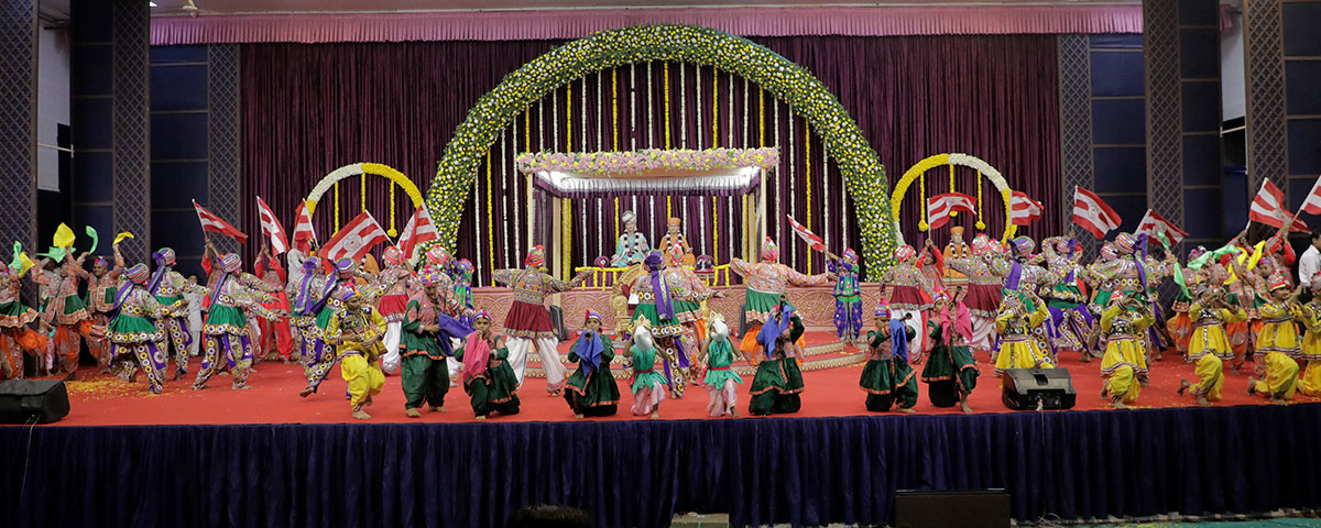 Children and youths perform a traditional dance