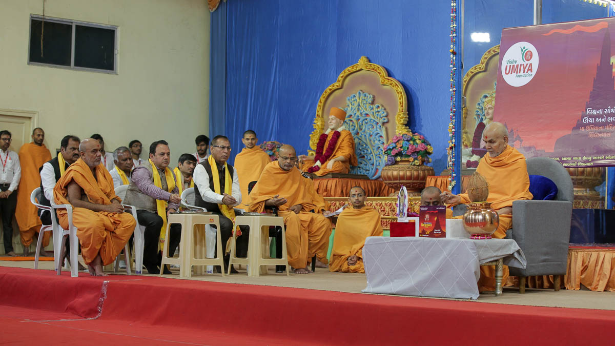 Trustees of the Vishv Umiya Foundation participate in the shila-pujan rituals