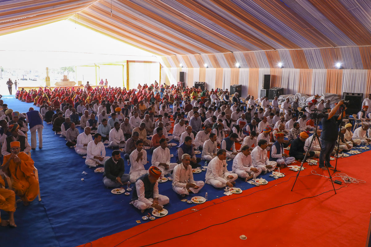 Devotees and well-wishers during the mahapuja rituals