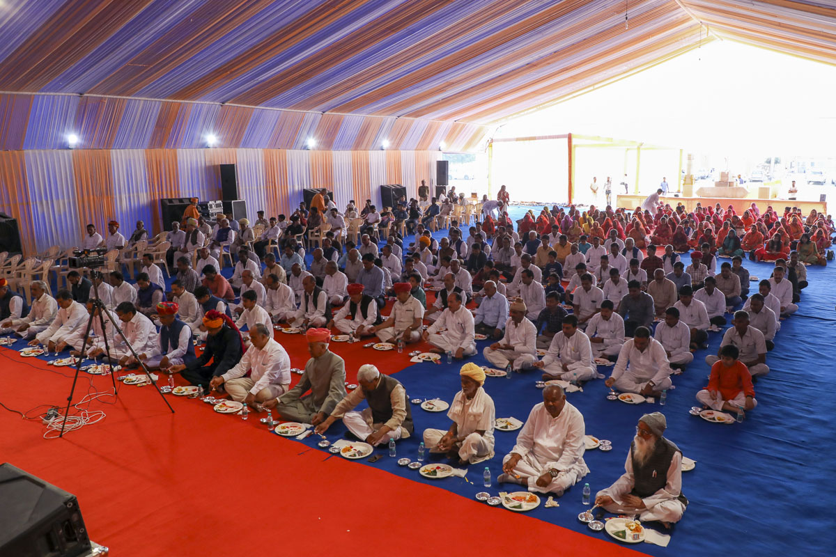 Devotees and well-wishers during the mahapuja rituals