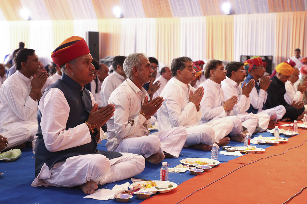 Devotees and well-wishers during the mahapuja rituals