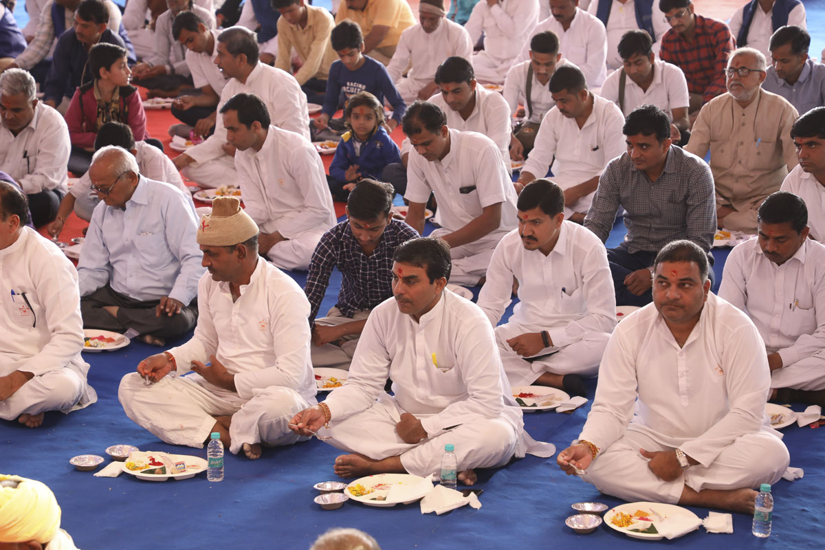 Devotees and well-wishers during the mahapuja rituals