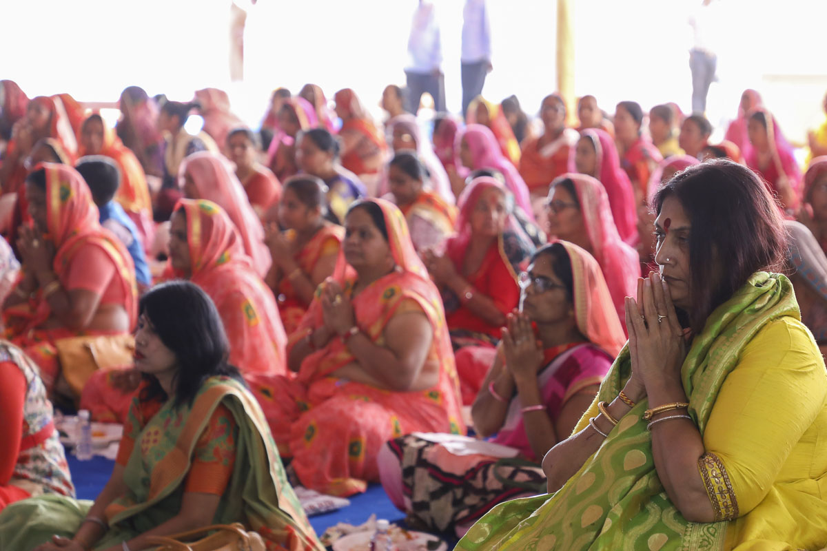 Devotees and well-wishers during the mahapuja rituals
