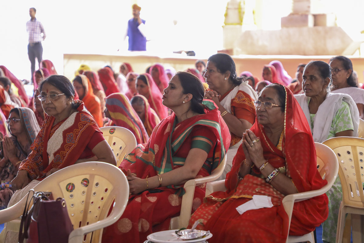Devotees and well-wishers during the mahapuja rituals