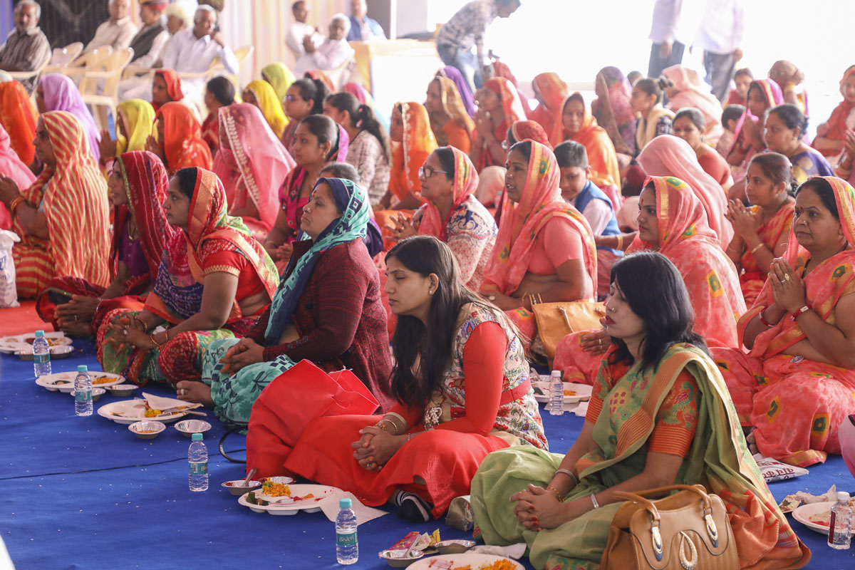 Devotees and well-wishers during the mahapuja rituals