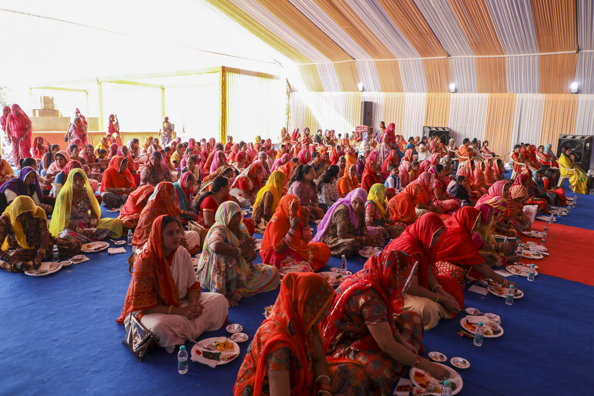 Devotees and well-wishers during the mahapuja rituals