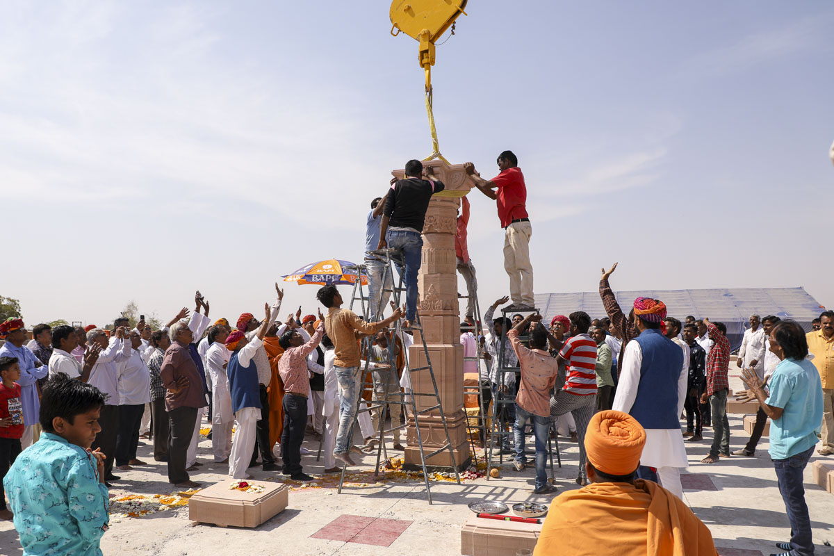 Placement of first stone pillar