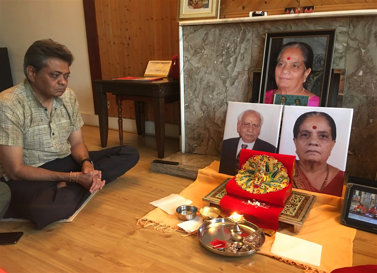 Devotees who had lost loved ones joined in the prayers from home