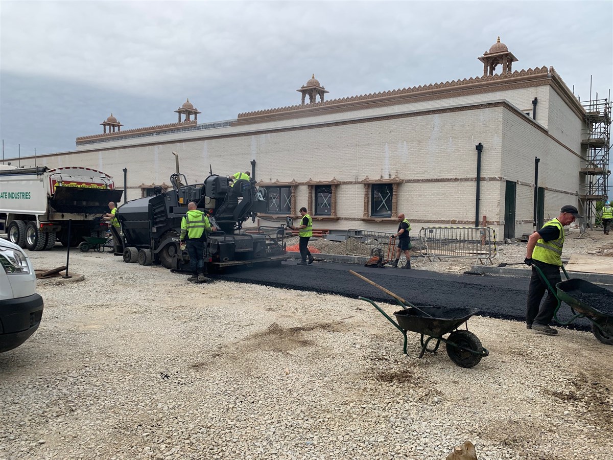 After the chhatris are in place, the tarmacking begins