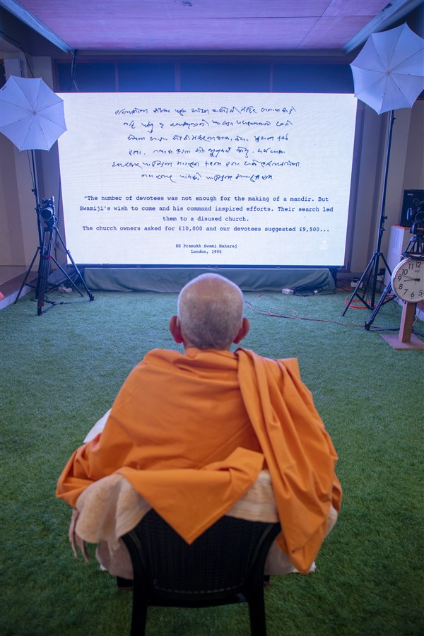 Swamishri watched the webcast from London commemorating the 50th anniversary of Yogiji Maharaj in the UK