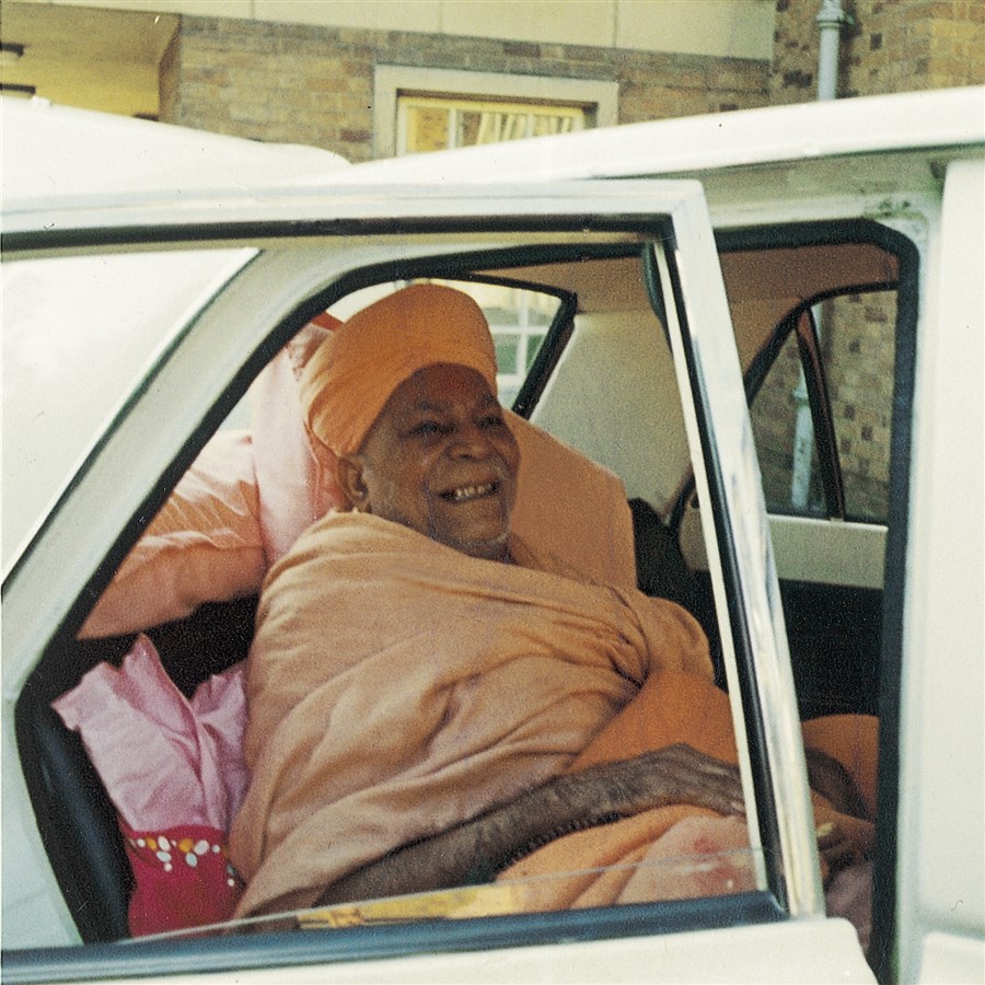 Upon arriving at his residence, whilst swamis were readying his wheelchair, Yogiji Maharaj insisted on stepping foot on the ground, thereby gracing the road in front of 69 Ellesmere Road, Dollis Hill, with his holy feet