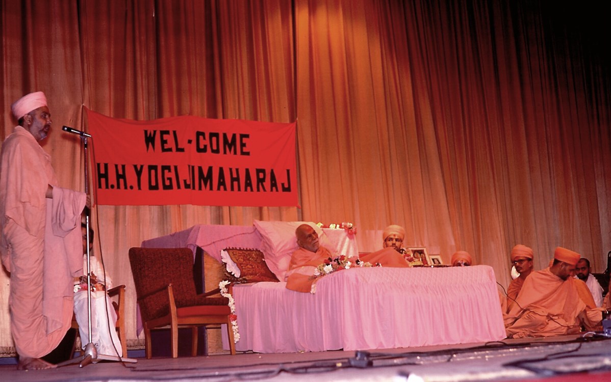 Pramukh Swami addresses the assembly during Yogiji Maharaj’s birth anniversary celebrations at Brent Town Hall