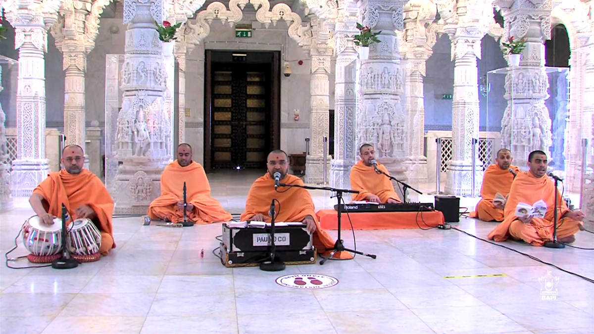 Swamis sang various lunchtime thals in front of the shrines at BAPS Shri Swaminarayan Mandir, London