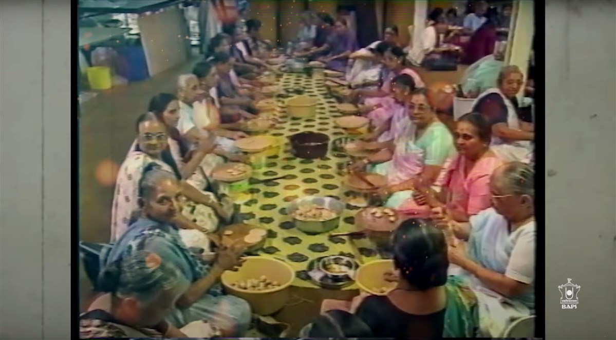 An archive shot of mahilas from around the UK making puris during the build-up of the opening of the Mandir