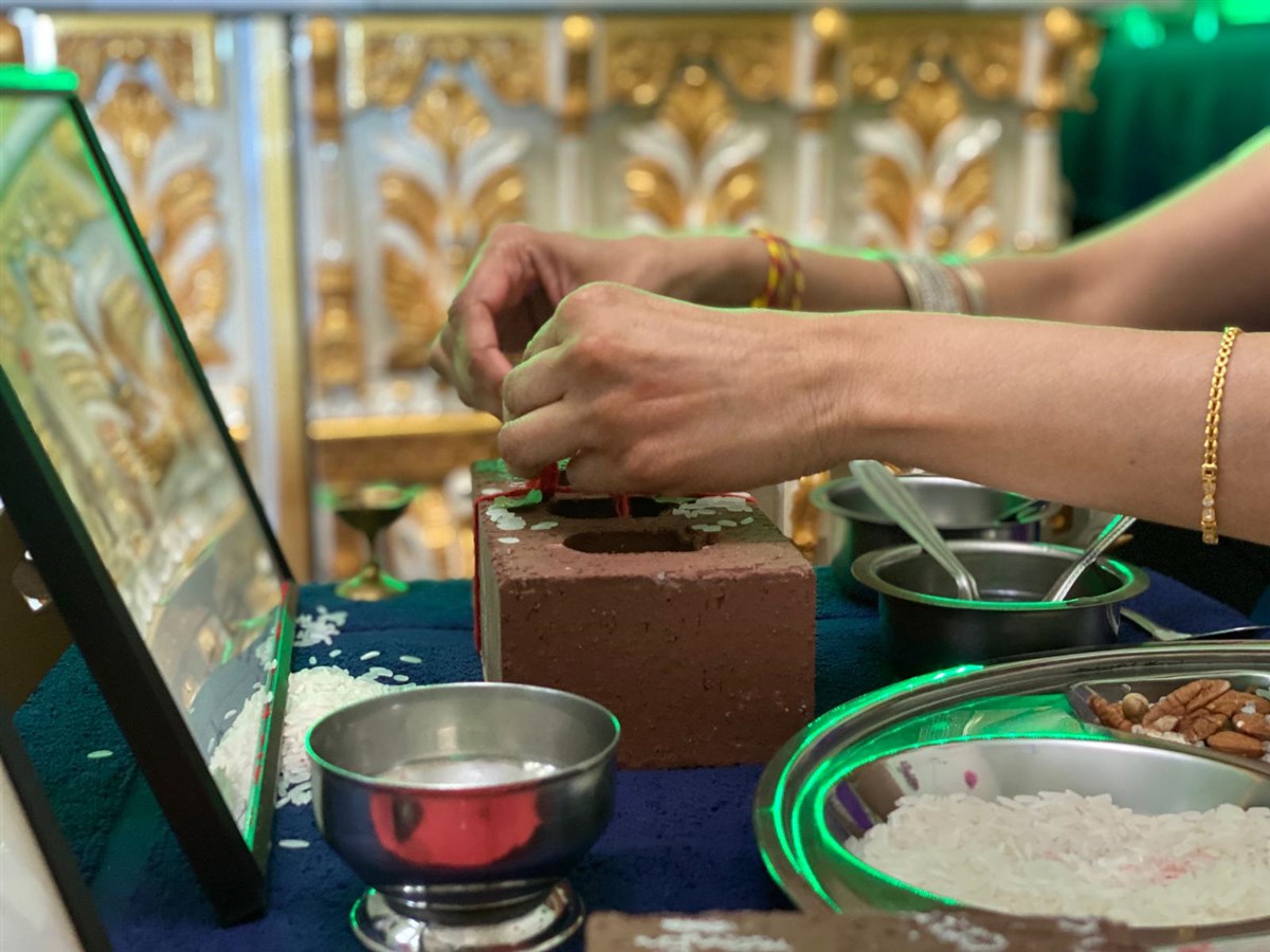 Devotees participating in the Shilayas Vidhi from their home