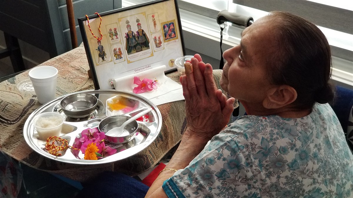 Devotees participating in the Shilayas Vidhi from their home