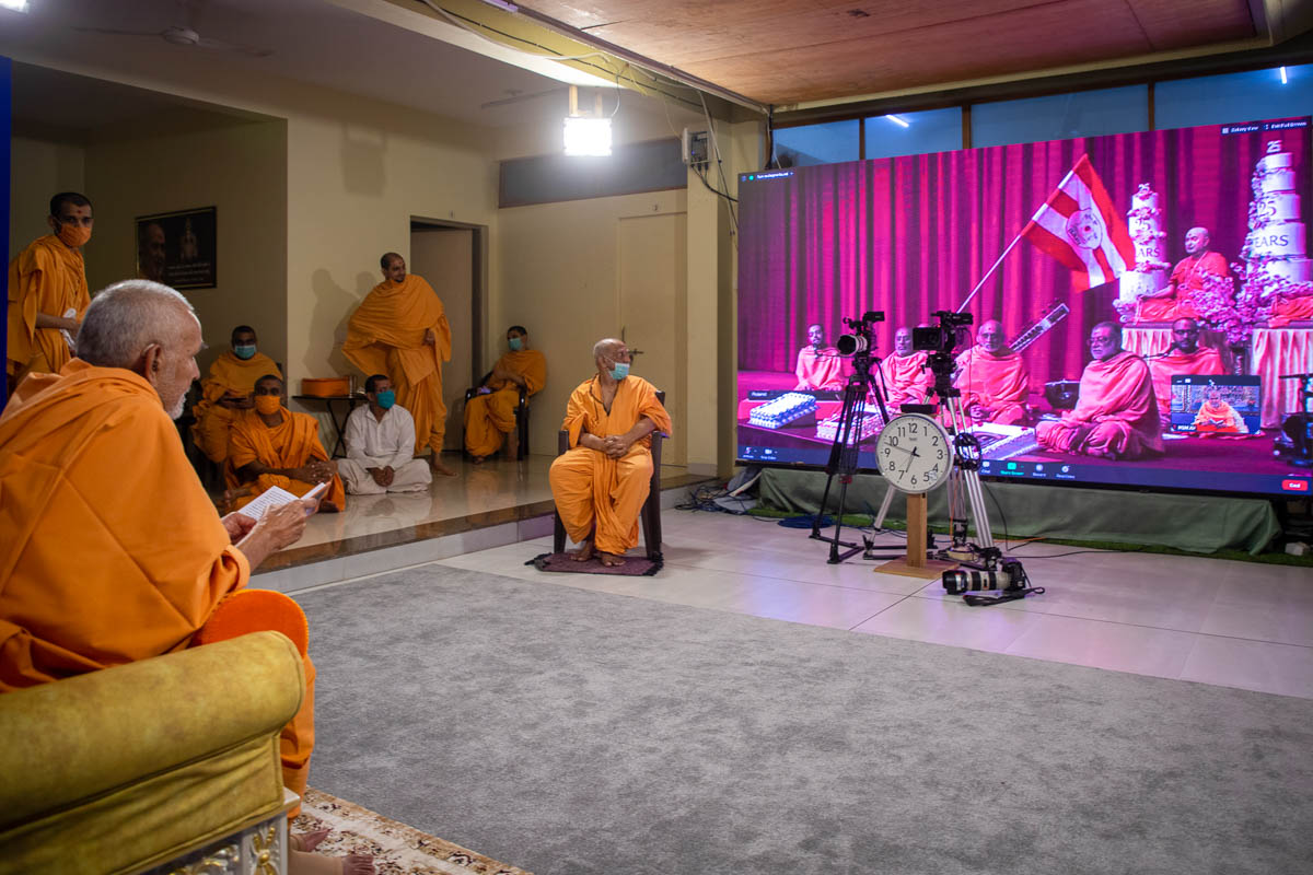 Sadhus at London Mandir sing kirtans in Swamishri's puja