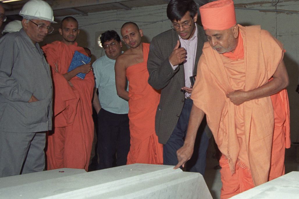 With many questioning whether the mandir would be completed on time, Swamishri visits the construction site, inspiring and reinvigorating everyone