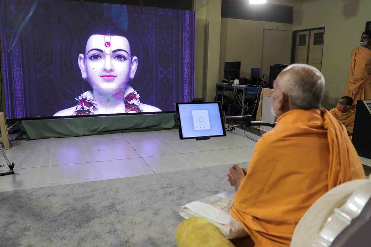 ... to remotely perform the abhishek of the murtis in London