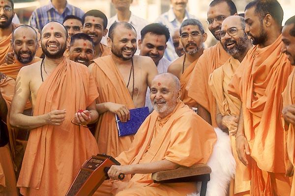  In a jovial mood with sadhus and devotees 