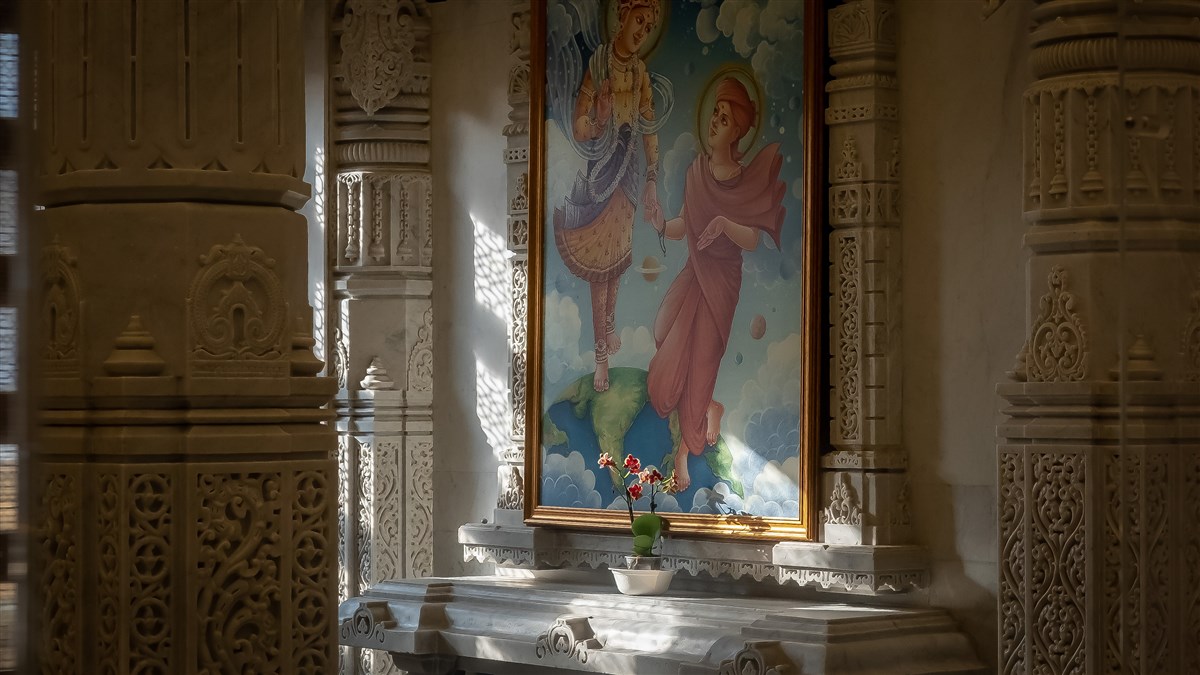 Artistic depictions of the history and theology of the BAPS Swaminarayan Hindu tradition adorn the marble walls of the Mandir