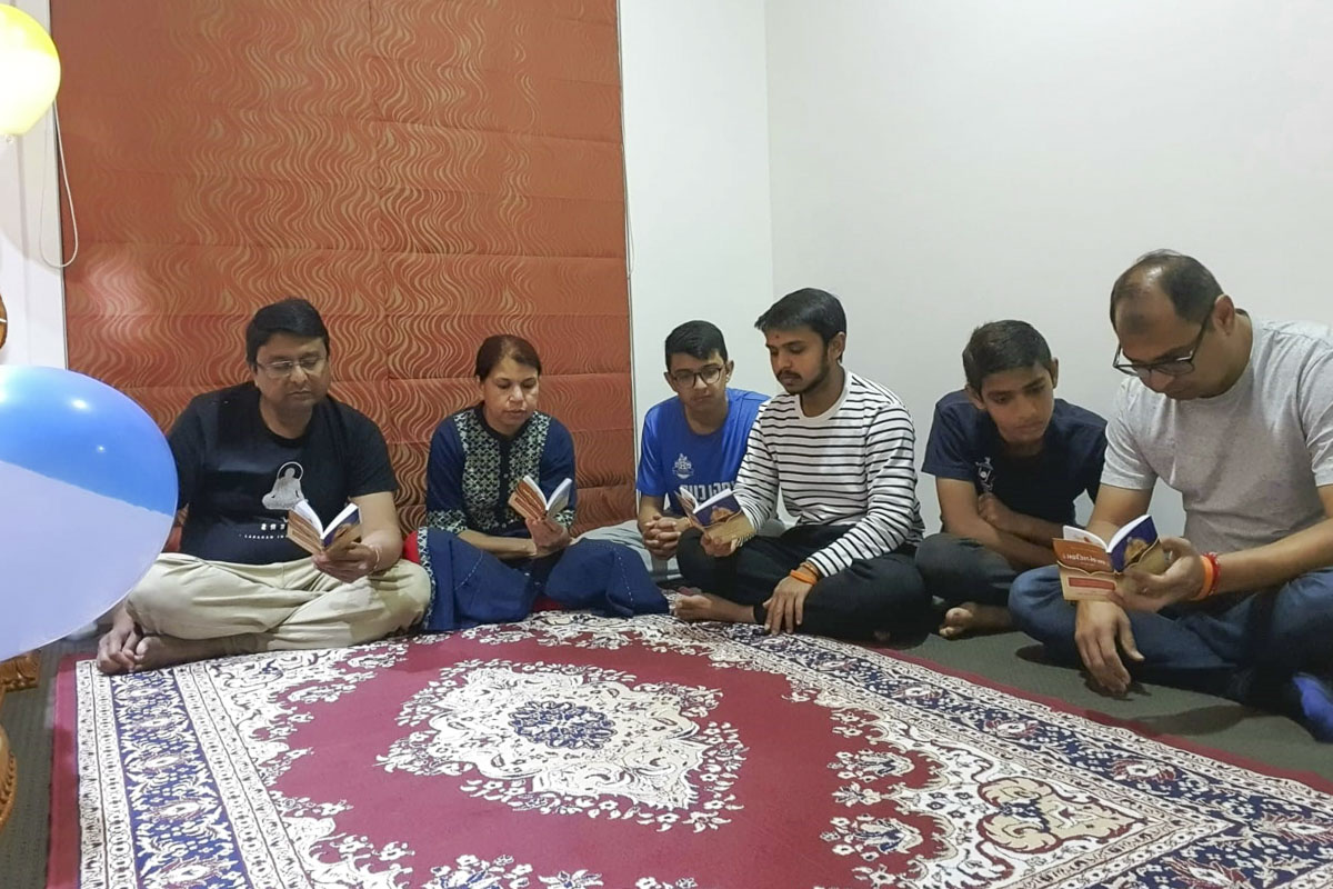 Devotees read 'Satsang Diksha'