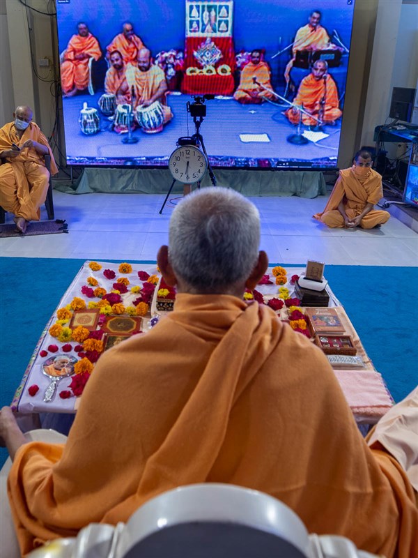 Sadhus sing kirtans via video conference from Anand Mandir
