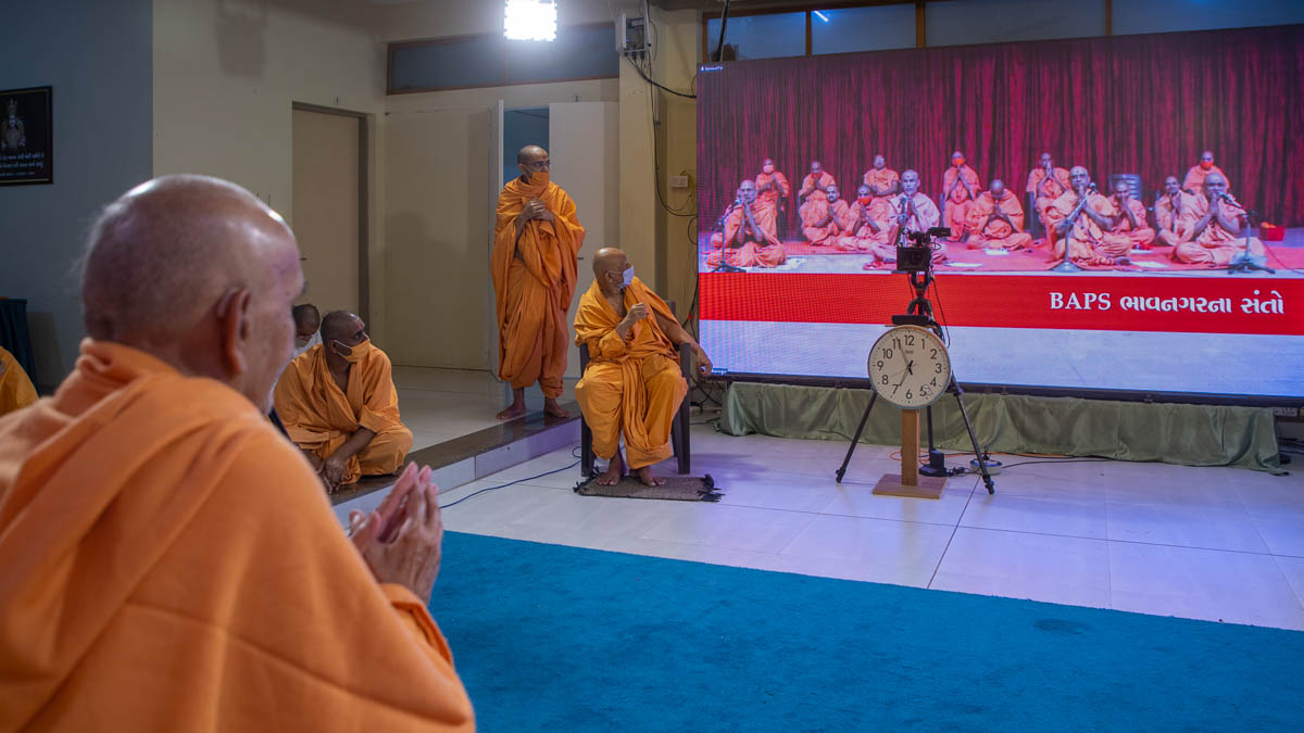 Sadhus doing darshan via video conference from Bhavnagar Mandir