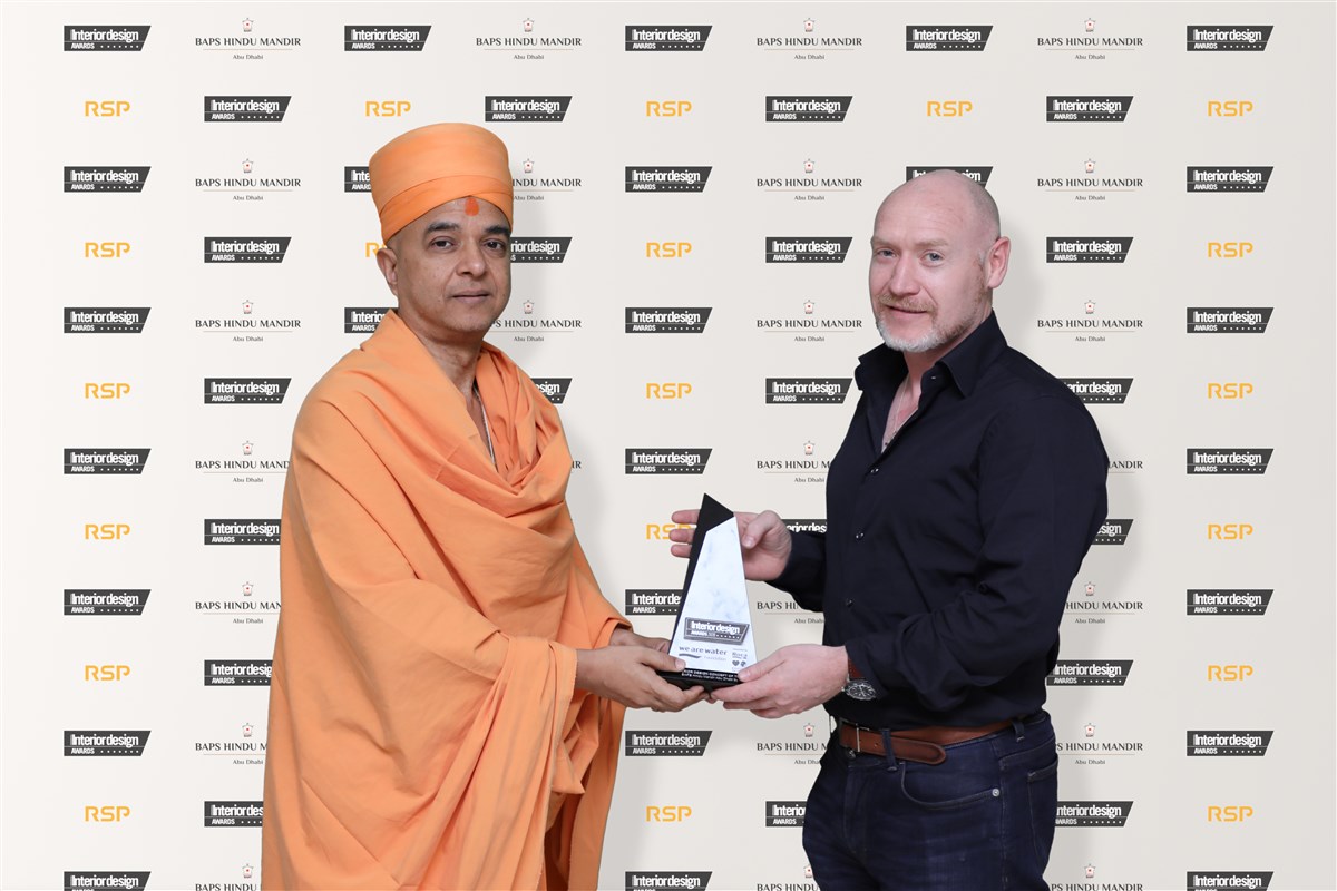 Brahmavihari Swami and Michael McGill of RSP with the CID Interior Design Concept Award