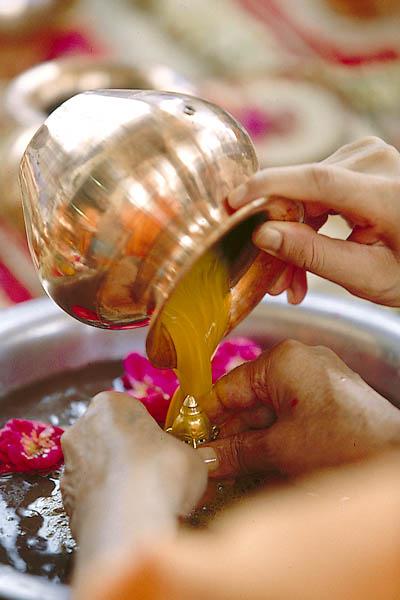  ... and bathes Shri Harikrishna Maharaj in holy water 